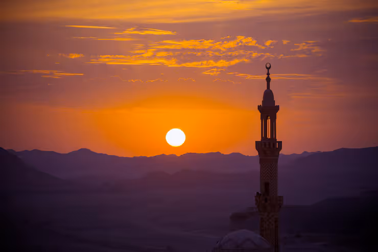 sunset-desert-with-muslim-mosque-foreground_1385-1.avif