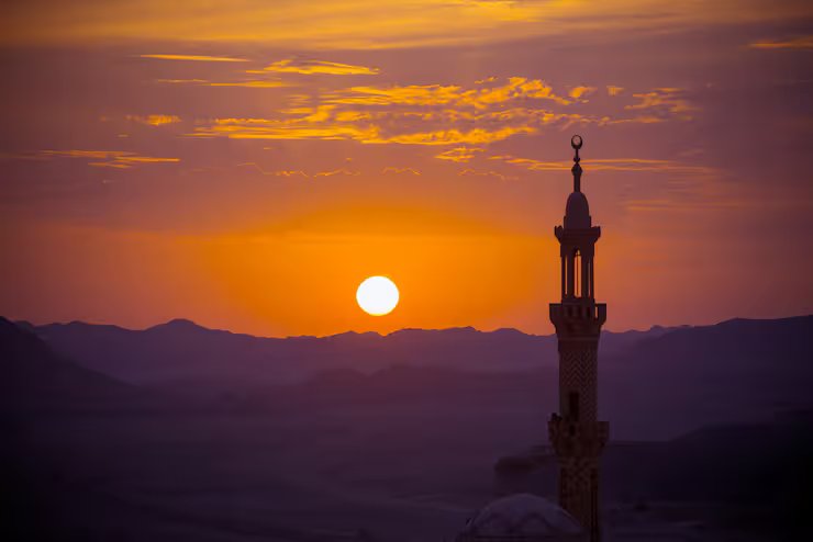 sunset-desert-with-muslim-mosque-foreground_1385-1.avif